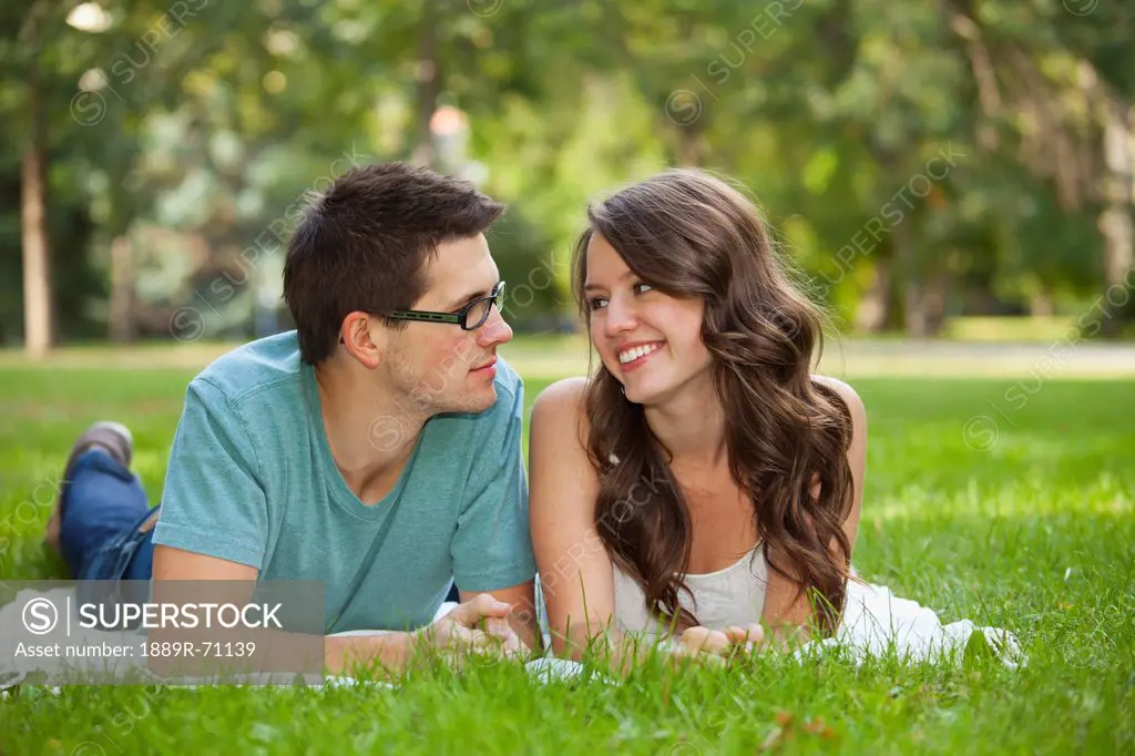 newlywed couple spending quality time together in a park, edmonton alberta canada