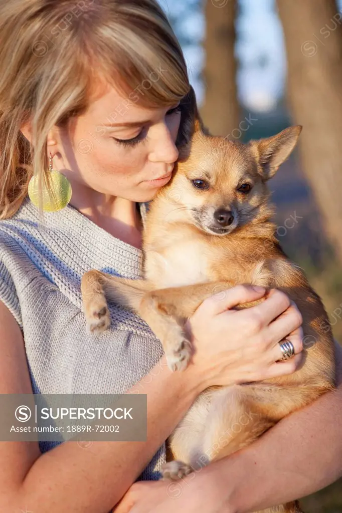 a woman with her pet dog, edmonton alberta canada