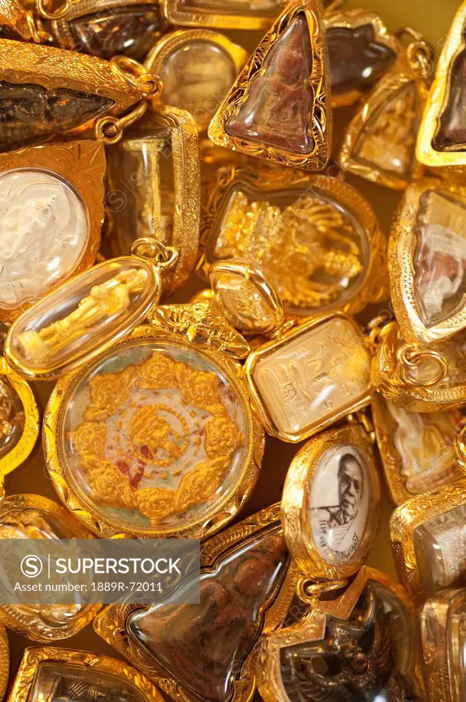 gold buddhist amulets, prachuap kiri khan prachuap province thailand
