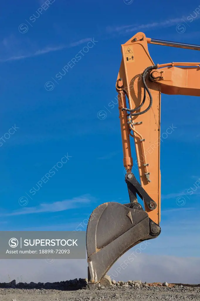 articulated arm and scoop of mechanical excavator, torremolinos malaga province spain