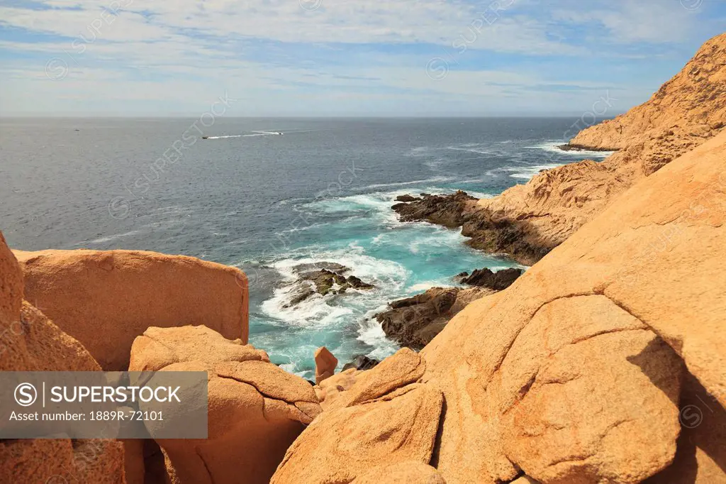 view of the rugged coastline and ocean in the los cabos area, baja california sur mexico
