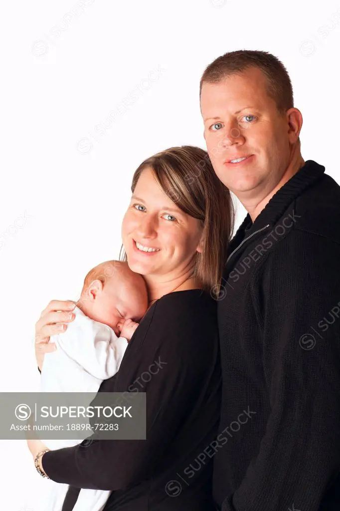 portrait of a family with a newborn baby, dundas minnesota united states of america
