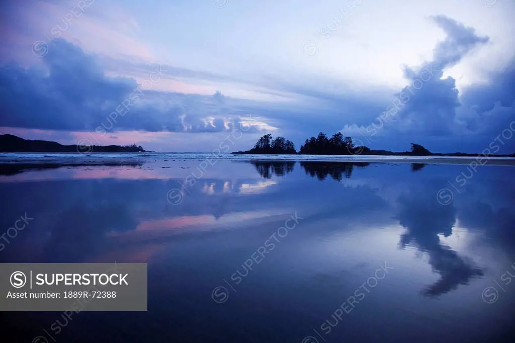 clouds over chesterman´s beach and frank´s island near tofino, british columbia canada