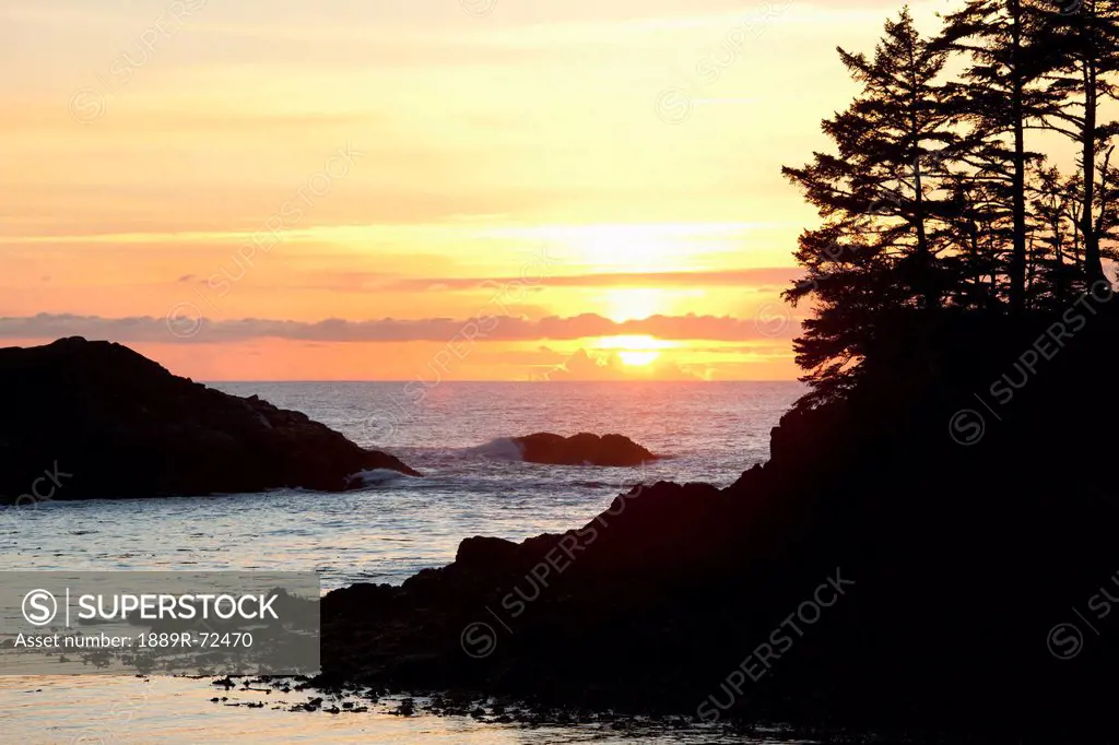 ucluth beach at wya point at sunset near ucluelet on vancouver island, british columbia canada