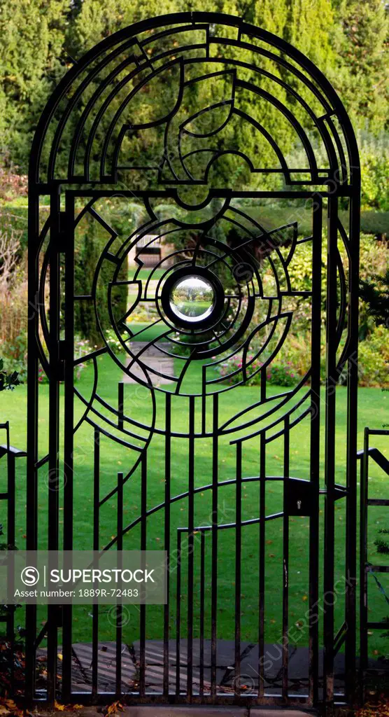 gate to the gardens at clare college university of cambridge, cambridge england