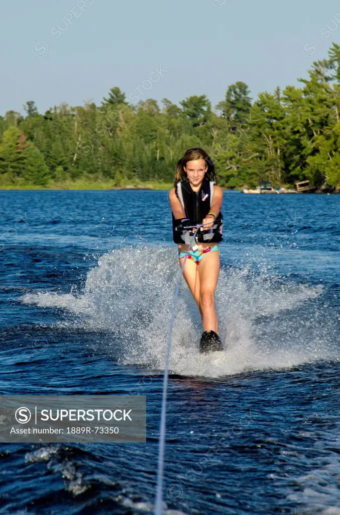 A girl waterskiing, lake of the woods ontario canada
