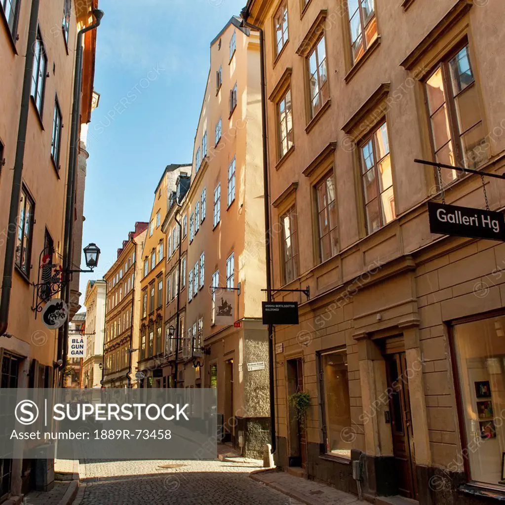 Buildings along a narrow street in old town, stockholm sweden