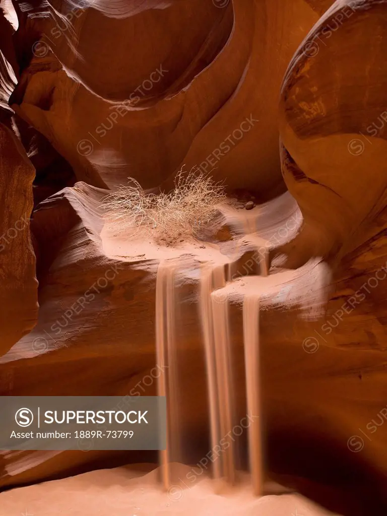 Sand Flowing Over The Sandstone Ledges, Arizona United States Of America