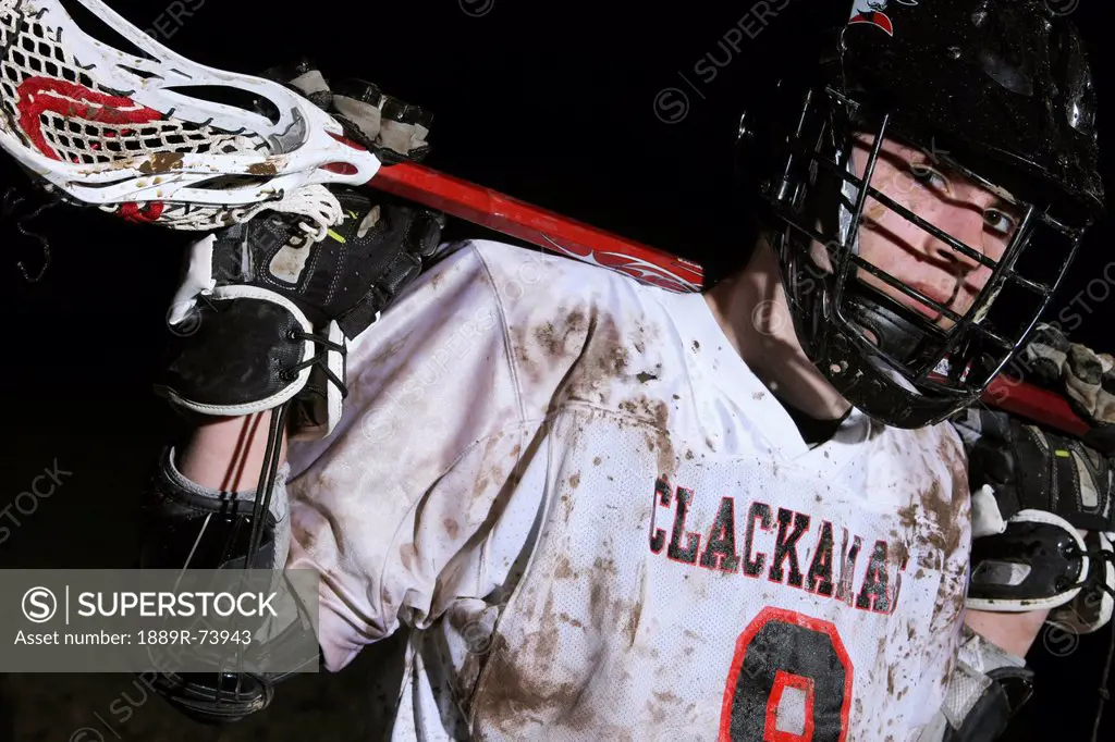 Lacrosse player holding stick behind head, troutdale oregon united states of america