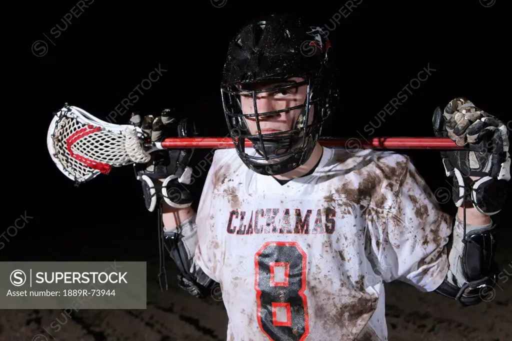Lacrosse player holding stick behind head, troutdale oregon united states of america
