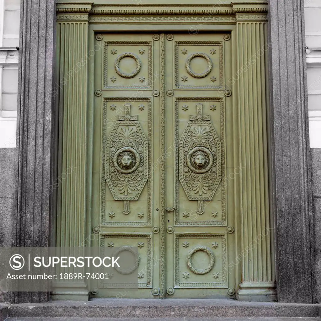 Ornate design on green doors, st. petersburg russia