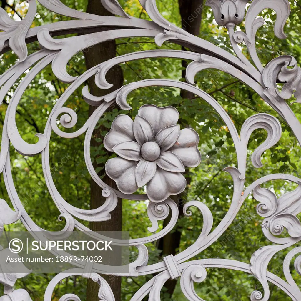 Flower and swirl design on a metal gate of the cathedral of the resurrection of christ, st. petersburg russia