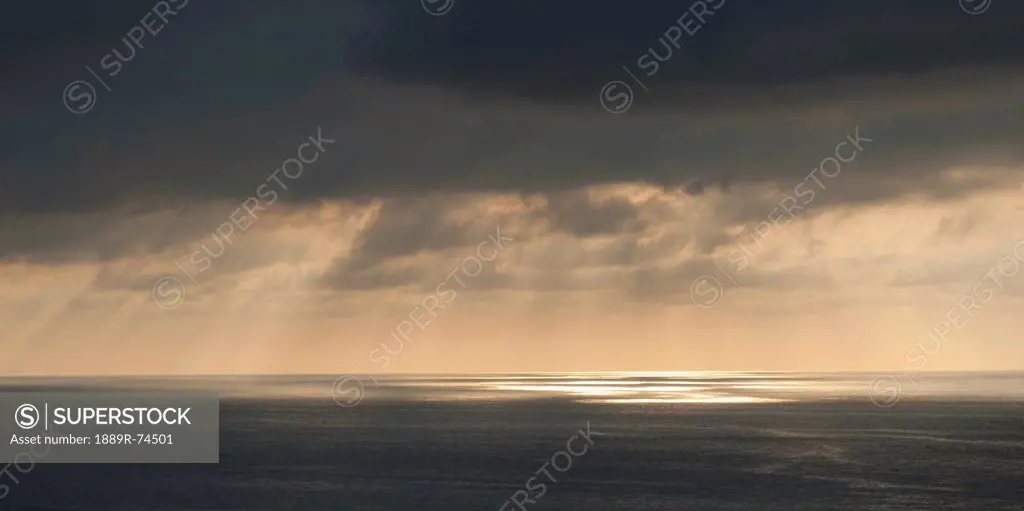 Sunlight through the storm clouds over the ocean, sayulita mexico