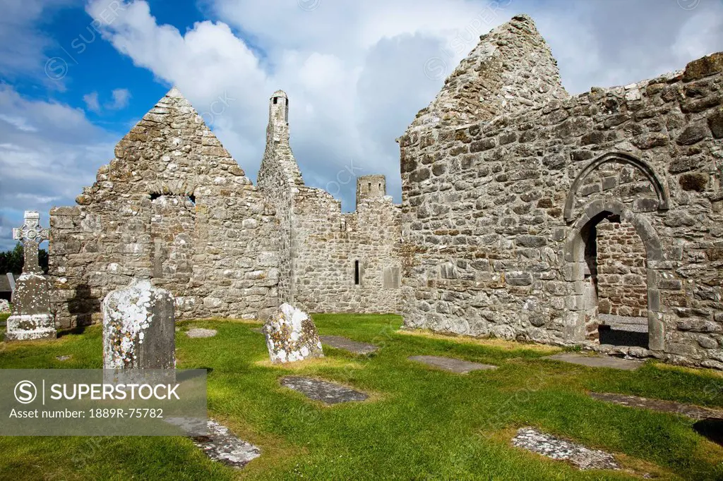 Tombstones In A Cemetery And An Old Cathedral, Clonmacnoise County Offaly Ireland
