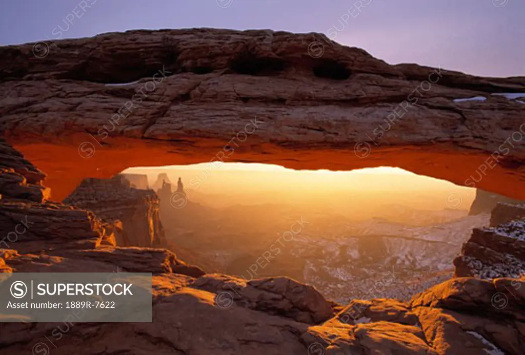 Washer Woman Arch seen through Mesa Arch at sunrise, Canyonlands National Park, Island In The Sky District
