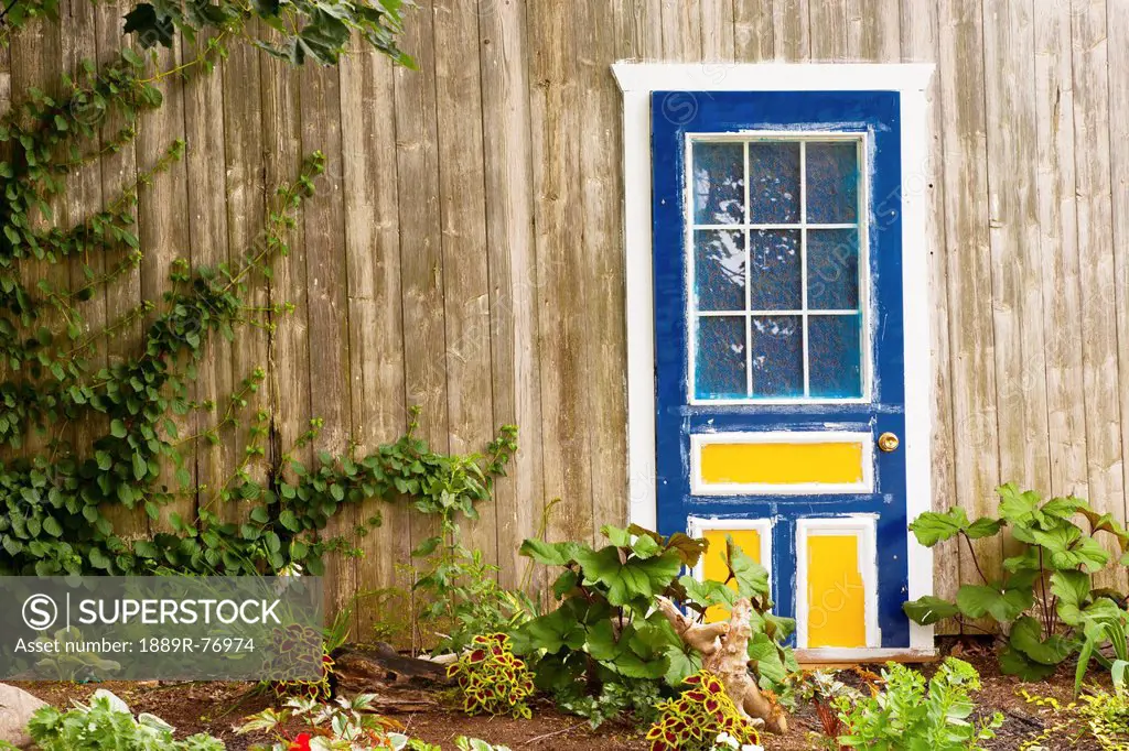 Blue Door And A Garden, St. Etienne_Des_Gres Quebec Canada