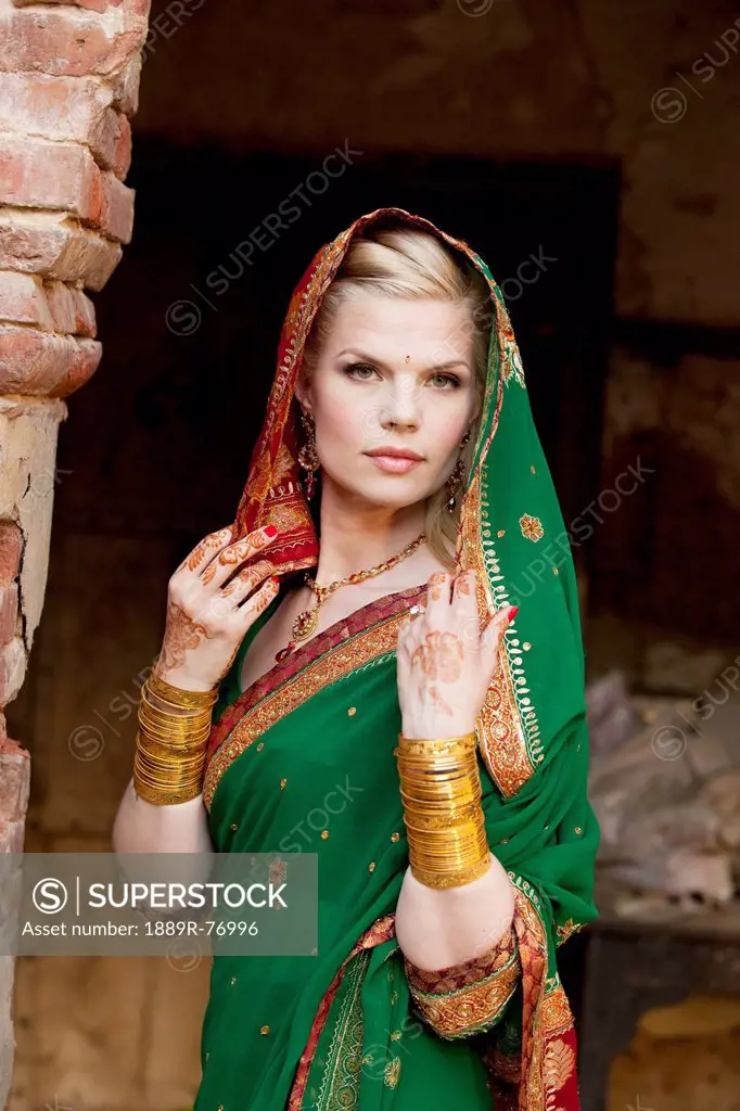Portrait of a blond woman wearing a sari and headscarf, ludhiana punjab india