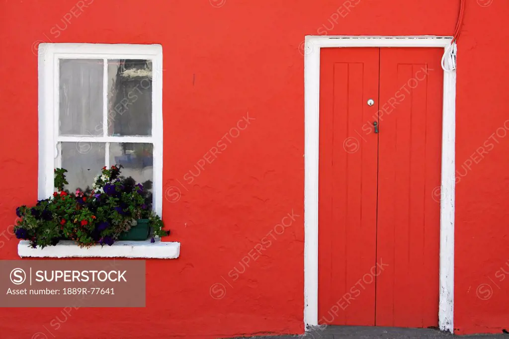 A Red Painted House With Flower Box In The Window, Eyeries County Cork Ireland