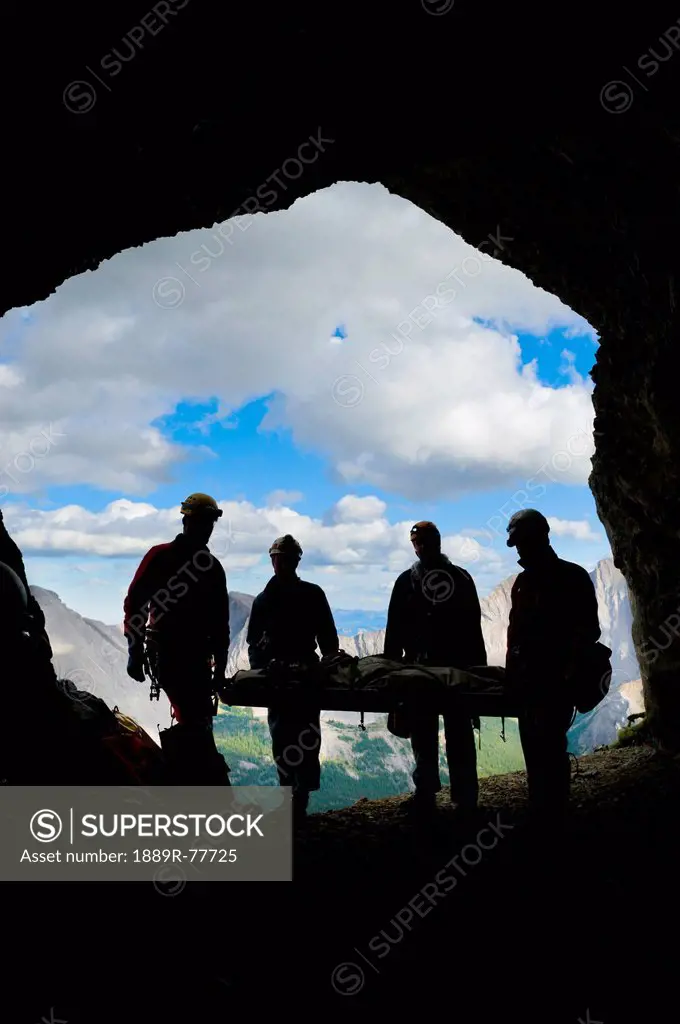 Participant´s silhouettes at a gargantua cave rescue, blairmore alberta canada