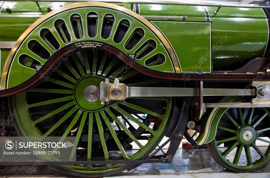 A shiny green vintage vehicle with large and small wheels, shildon durham england