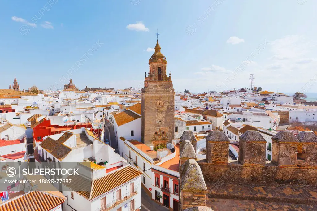 View over town centre to church of san bartolome, carmona seville province spain