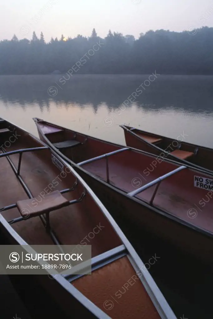 Canoes on Still Water