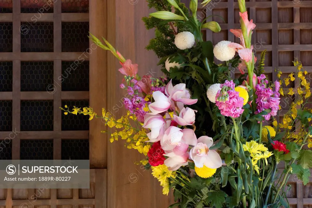 Flower bouquet in front of a japanese temple, koyasan, wakayama, japan