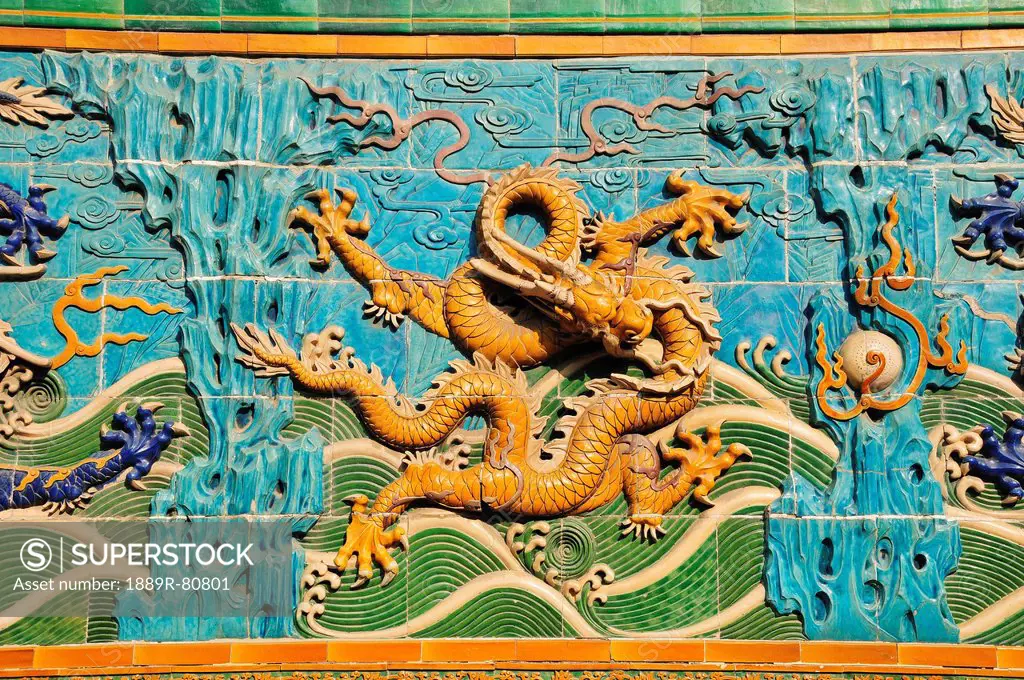 Dragon design on a wall, beijing china