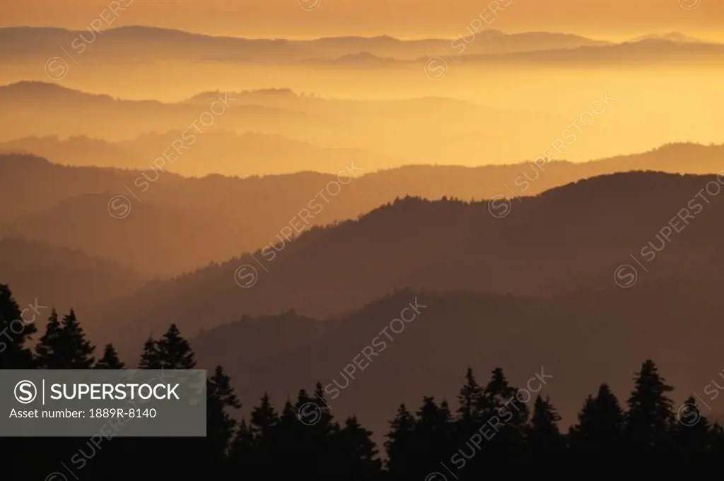 Hazy ridges of Trinity Alps at sunset