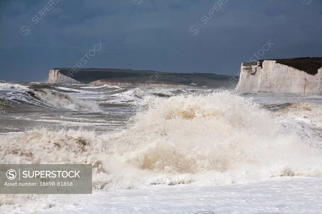 Seven sisters chalk cliffs with big waves, sussex, england