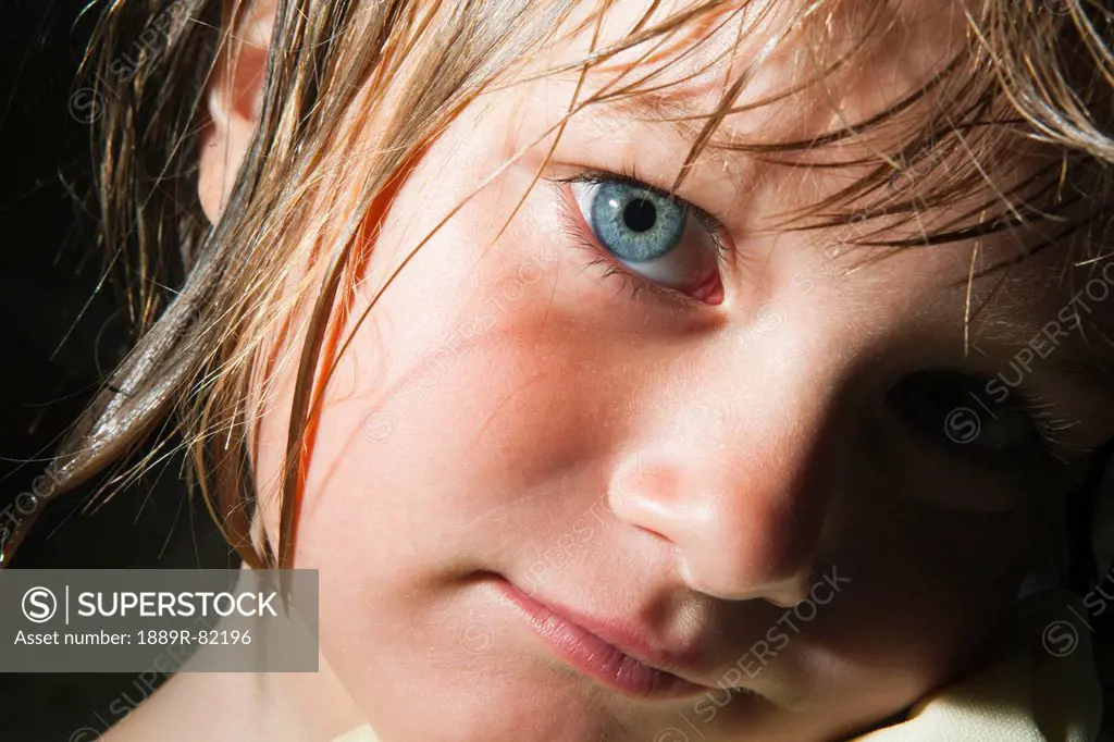 Portrait of a girl with blue eyes and wet hair, tarifa, cadiz, andalusia, spain