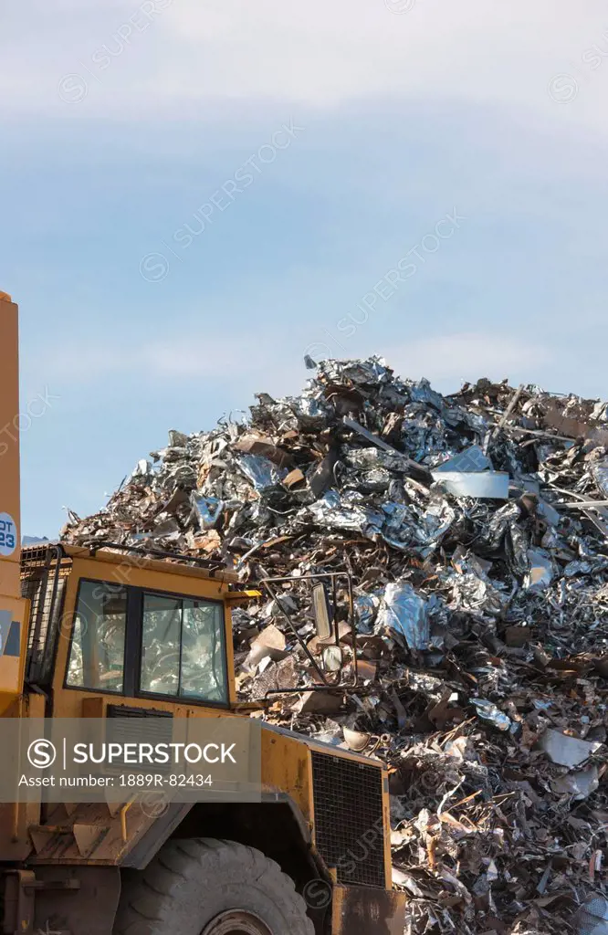 A truck in front of a large pile of garbage, south shields, tyne and wear, england