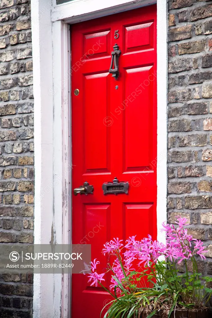 A painted red door on a house, dublin city, county dublin, ireland