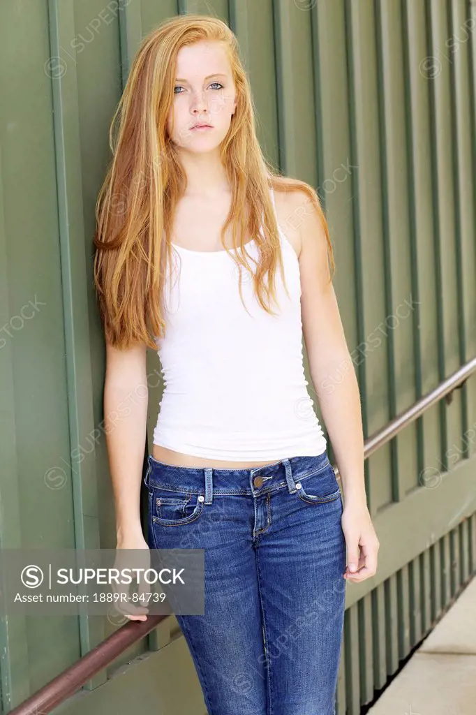 Portrait of a young woman with long red hair, kauai hawaii united states of america