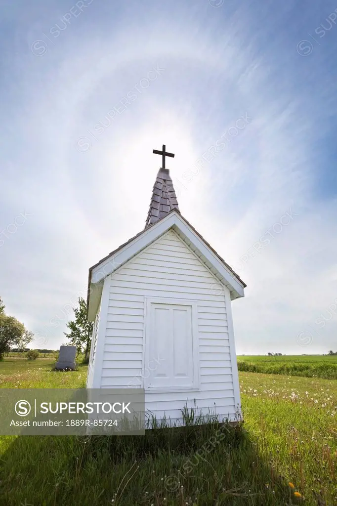 Cross On Crypt With Sun Halo Near Minnedosa, Manitoba Canada