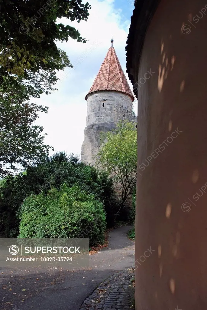 A Building With A Round Tower And Peaked Roof, Germany