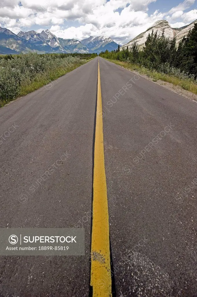 A Road Leading To The Canadian Rocky Mountains, Alberta Canada