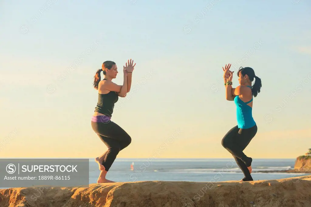 Women Practising Yoga Near Pacific Beach, San Diego California United States Of America