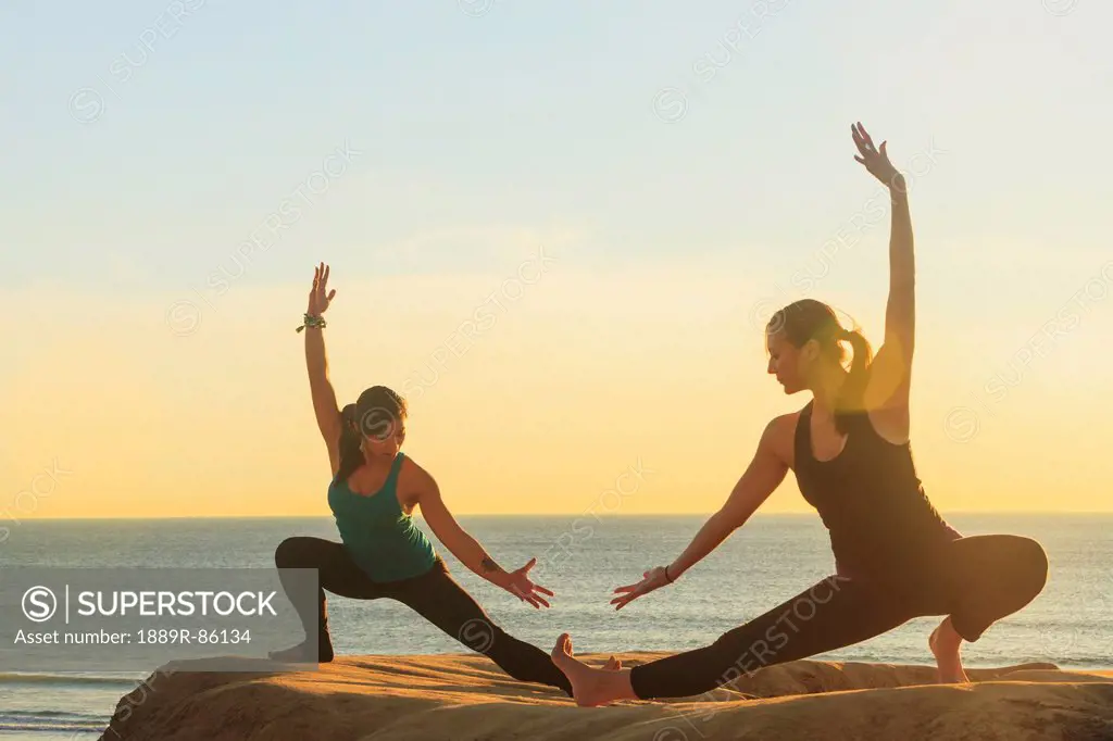 Women Practising Yoga Near Pacific Beach, San Diego California United States Of America