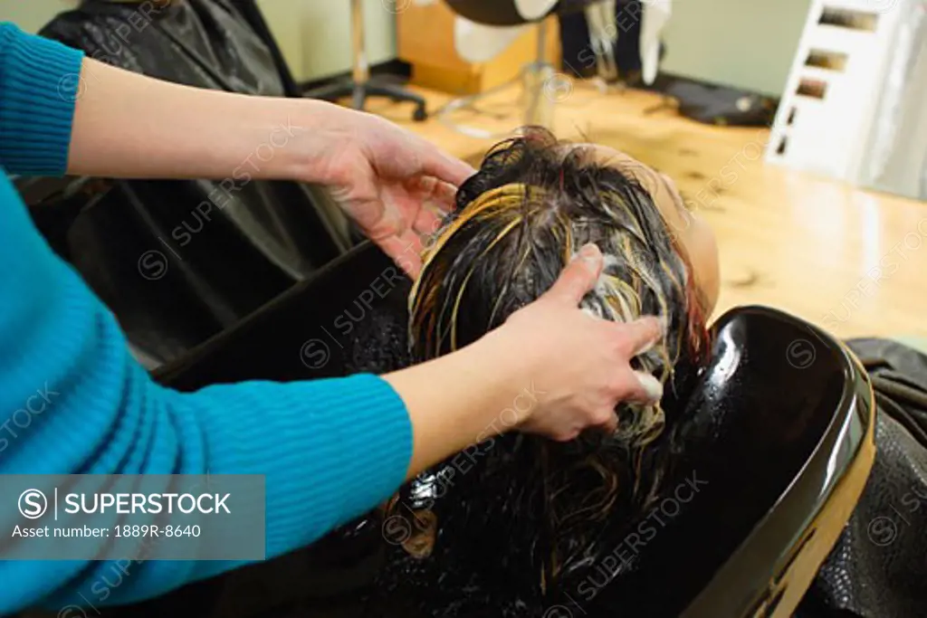 Geting hair washed at a hair salon