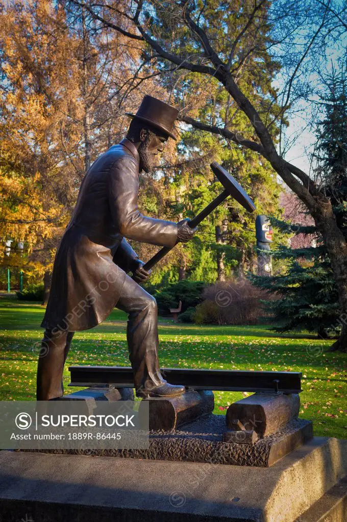 Bronze Statue Of Railroad Official Hammering;Edmonton Alberta Canada