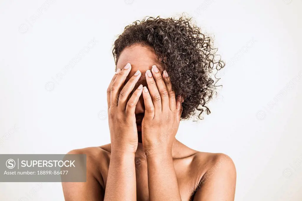 A Young Woman Covering Her Face With Her Hands;Connecticut United States Of America