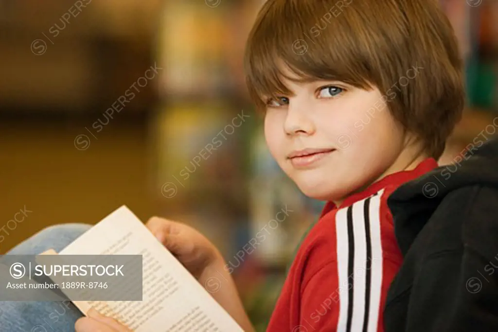 A young boy with a book