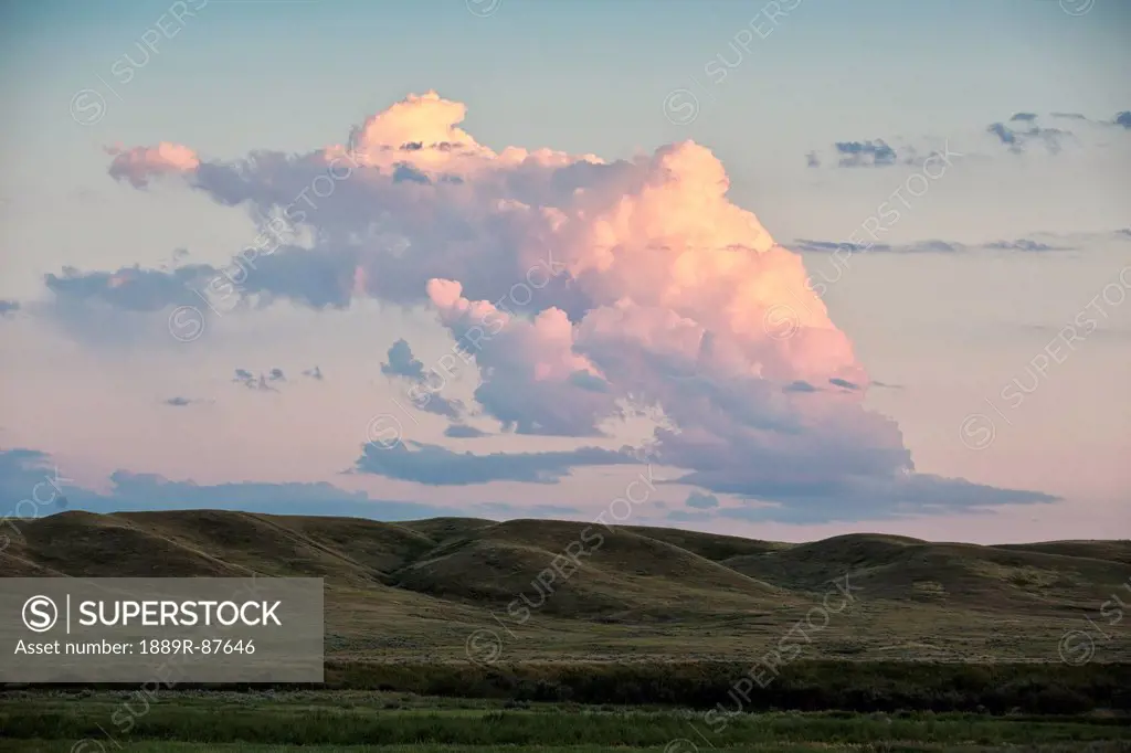Small Cumulonimbus Cloud Over Grasslands National Park;Saskatchewan Canada