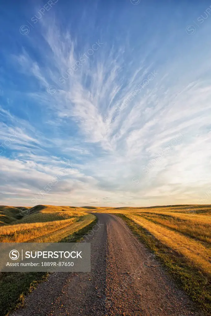 A Lonely Road Goes Off Into The Distance In Grasslands National Park;Saskatchewan Canada