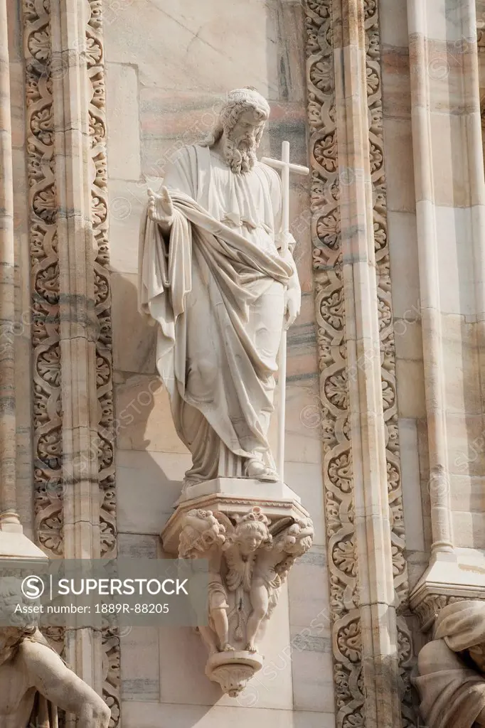 Marble Statue On Marble Cathedral With Cross;Milano Lombardia Italy