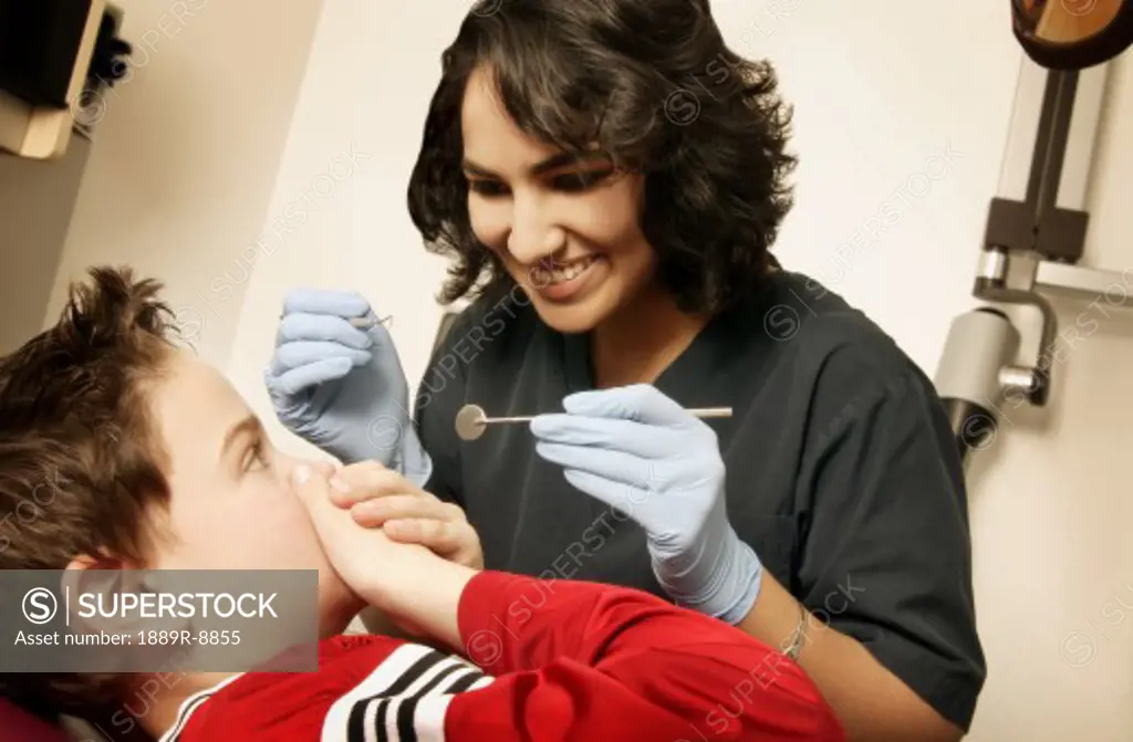 Child with dental hygienist