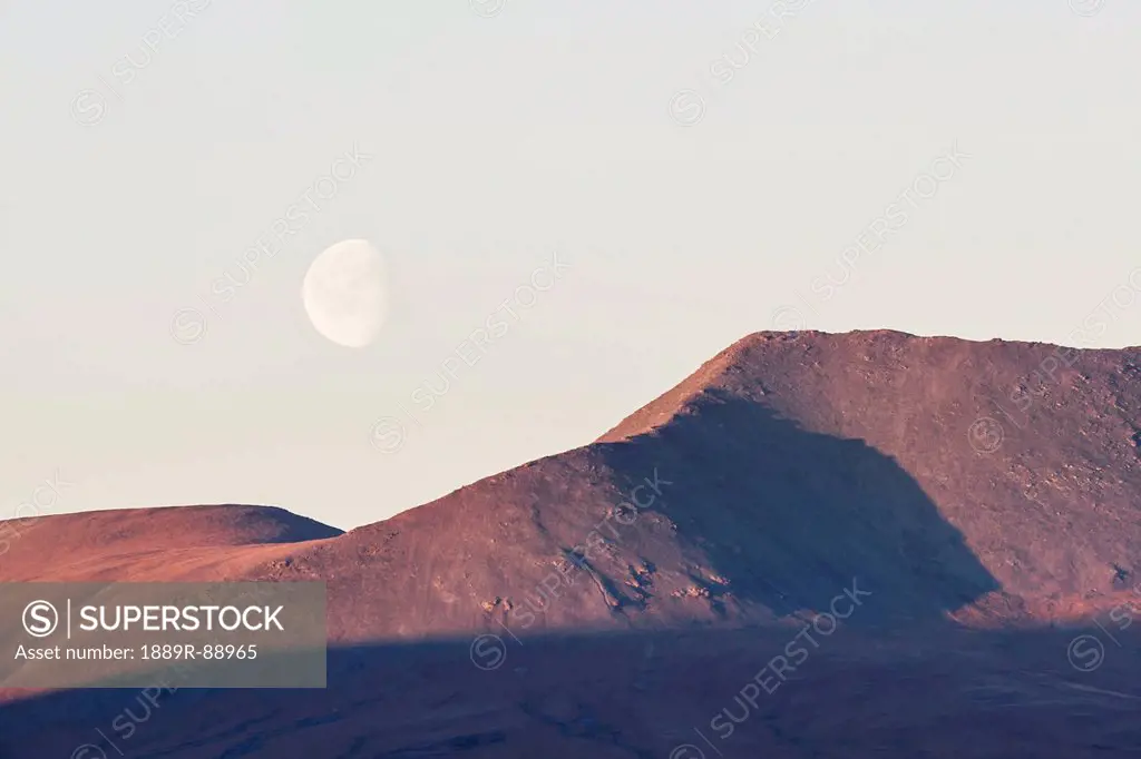 Moon in the sky and brooks range gates of the arctic national park northwestern alaska;Alaska united states of america