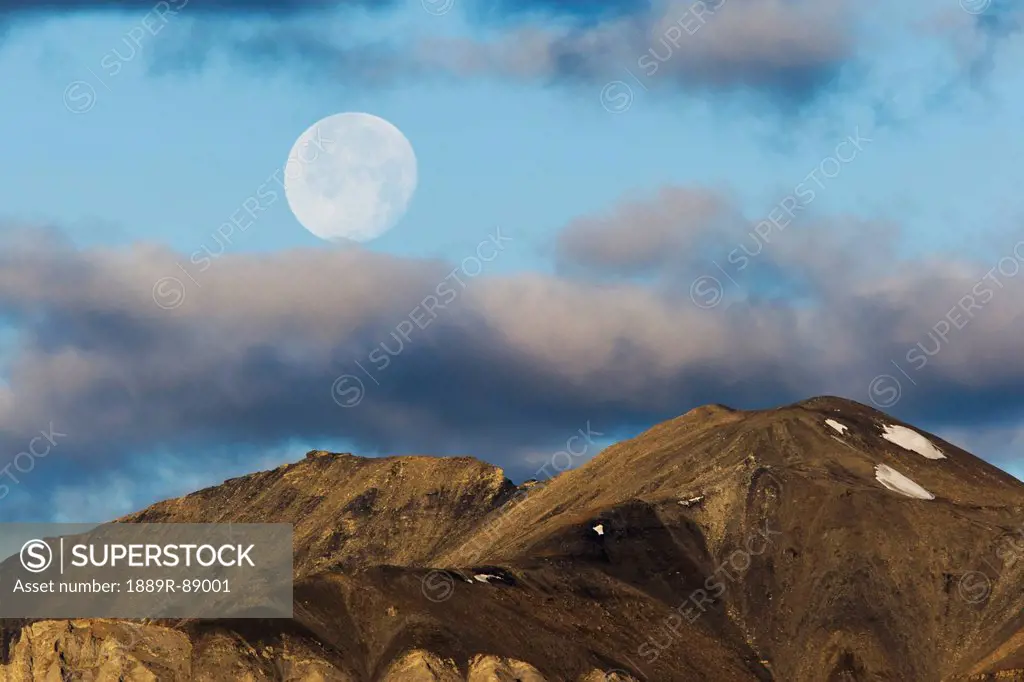 Full moon in the sky above brooks range gates of the arctic national park northwestern alaska;Alaska united states of america