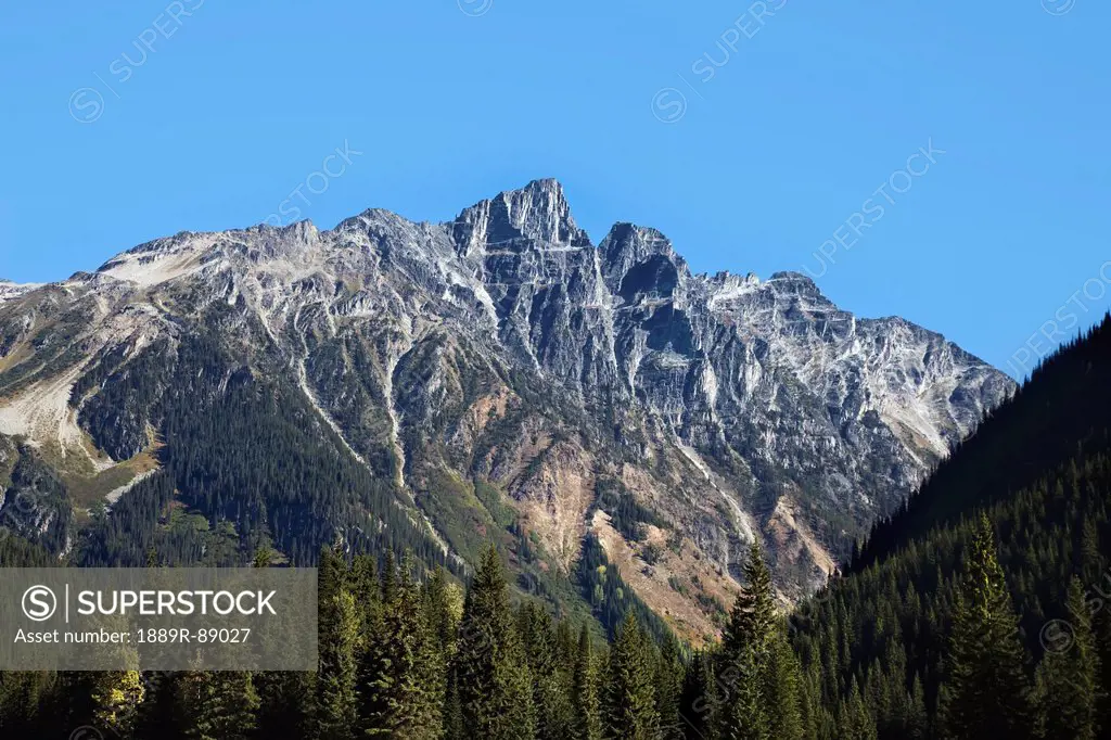 Rocky mountains against a blue sky;Alberta canada